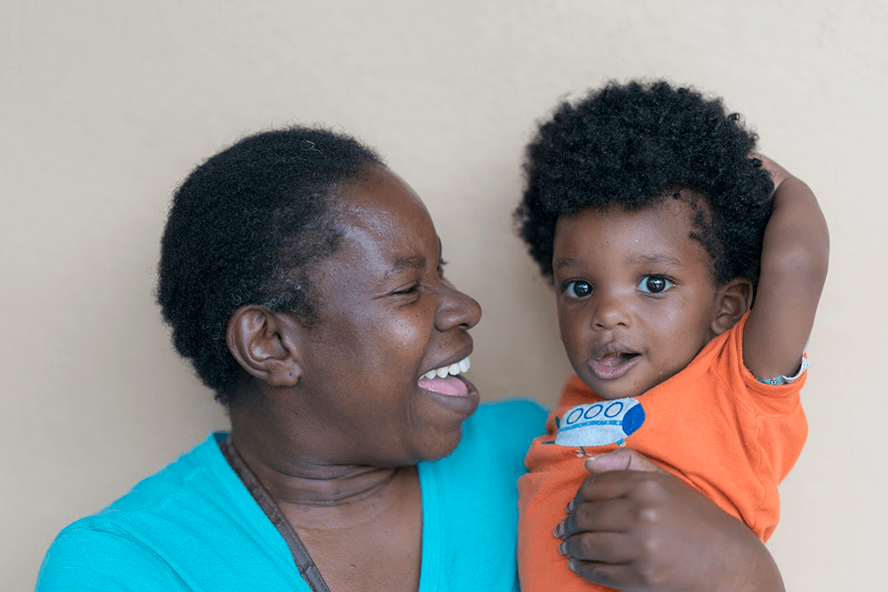 Atlanta Mission 2018 mom and son celebrating generosity