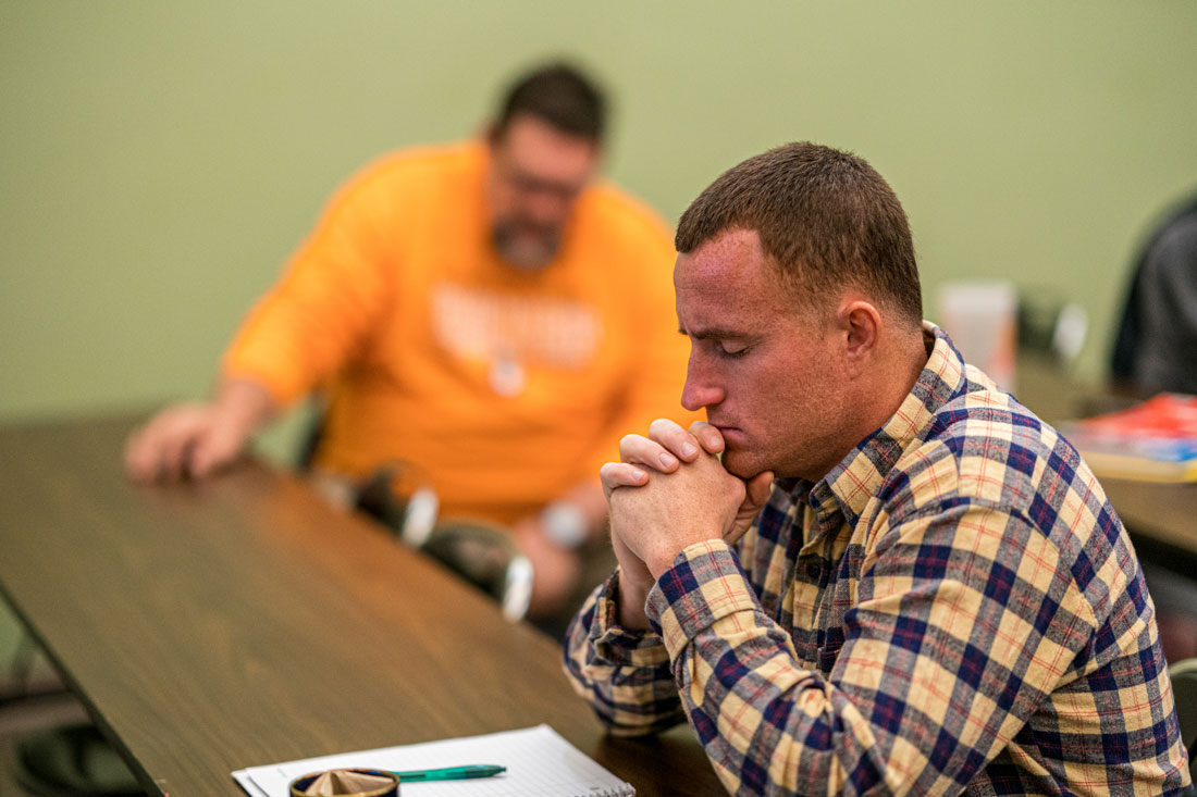 Man praying at TPH