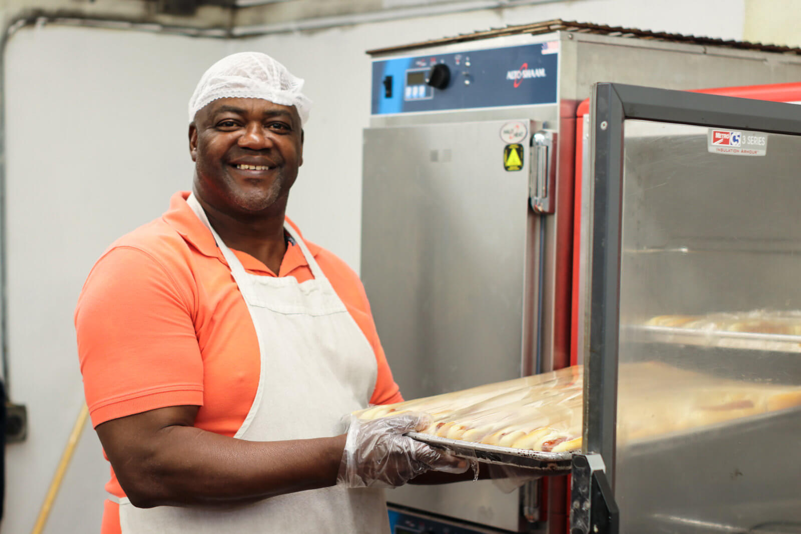 man in kitchen cooking