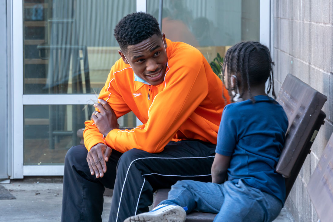 Tobias with child at MSH