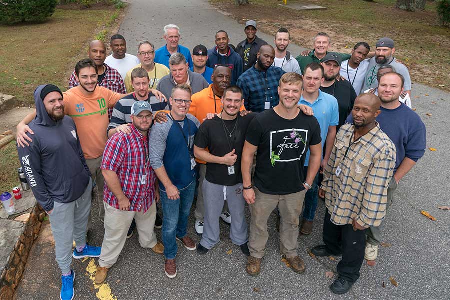 Group of clients smiling at The Potter's House