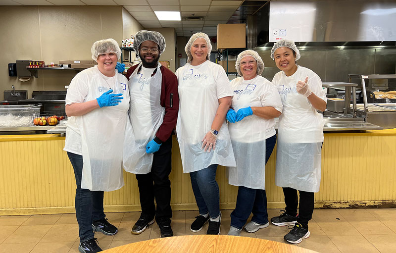 GPS Hospitality team volunteering in the kitchen at MSH