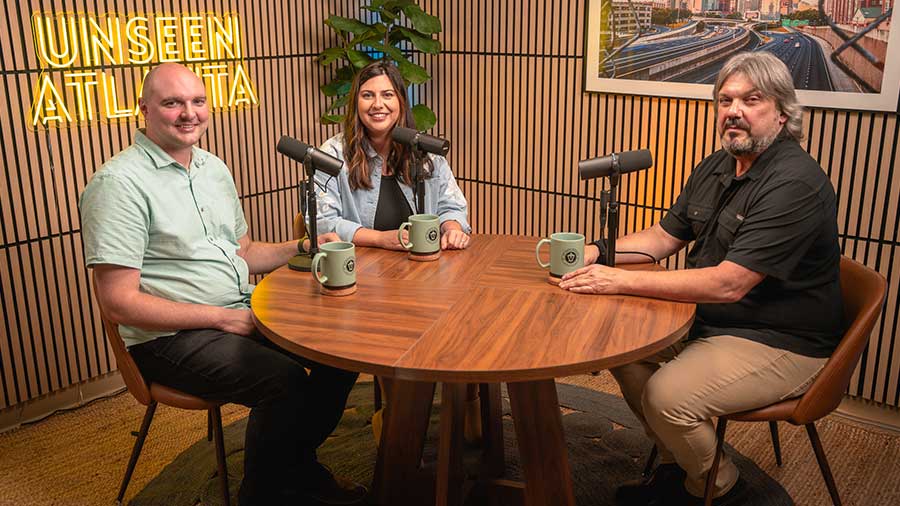 Podcast hosts Rachel and Jonathan with guest Michael Sheppard discussing community